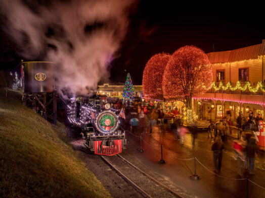 Main Street and locomotive No. 12, Tweetsie, decorated with Christmas Lights for Tweetsie Christmas